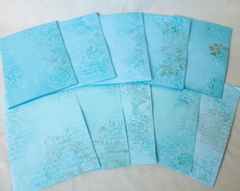 Hand-dyed blue  journal pages wet stenciled and stamped