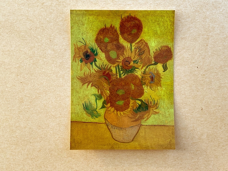 May include: A painting of a vase filled with sunflowers. The sunflowers are yellow with brown centers and are arranged in a loose, organic way. The background is a yellow-green color.