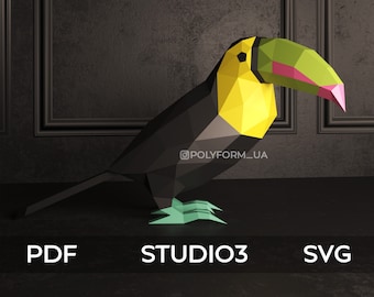 May include: A black, yellow, and green origami toucan with a long beak. The toucan is standing on a black surface. The image includes the text "@POLYFORM_UA".
