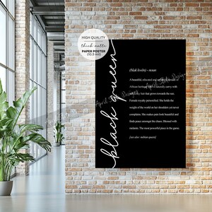 May include: Black and white poster with the word "black queen" written in cursive. The poster defines the word "black queen" as a beautiful, educated, and able female of African heritage who is naturally curvy with curly hair that grows towards the sun. The poster also states that a black queen is female royalty personified, holds the weight of the world on her shoulders, makes pain look beautiful, and finds peace amongst the chaos.