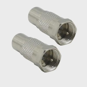 May include: Two silver-colored metal F-type coaxial cable connectors. Each connector features a cylindrical body with a textured, knurled grip section and a threaded hexagonal end. A thin, pointed metal pin is visible in the center of each opening.