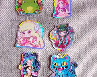 Pegatinas, des filles cool et des créatures mignonnes : Huntrix, Maomao, Chii, Lum, Derpy et la grenouille