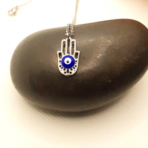 Upside down hand necklace sale
