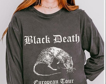 May include: A dark gray long-sleeved t-shirt with a white graphic of a rat and the text "Black Death European Tour 1347-1351".