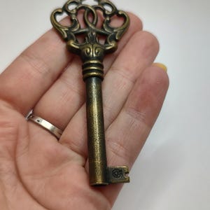 True Vintage Skeleton key,French Brass key,Collectible skeleton cabinet key with no 4