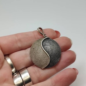 Antique hallmarked 800 silver ying and yang pendant