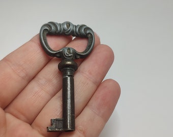 Vintage messing loper: antieke kastmeubelsleutel