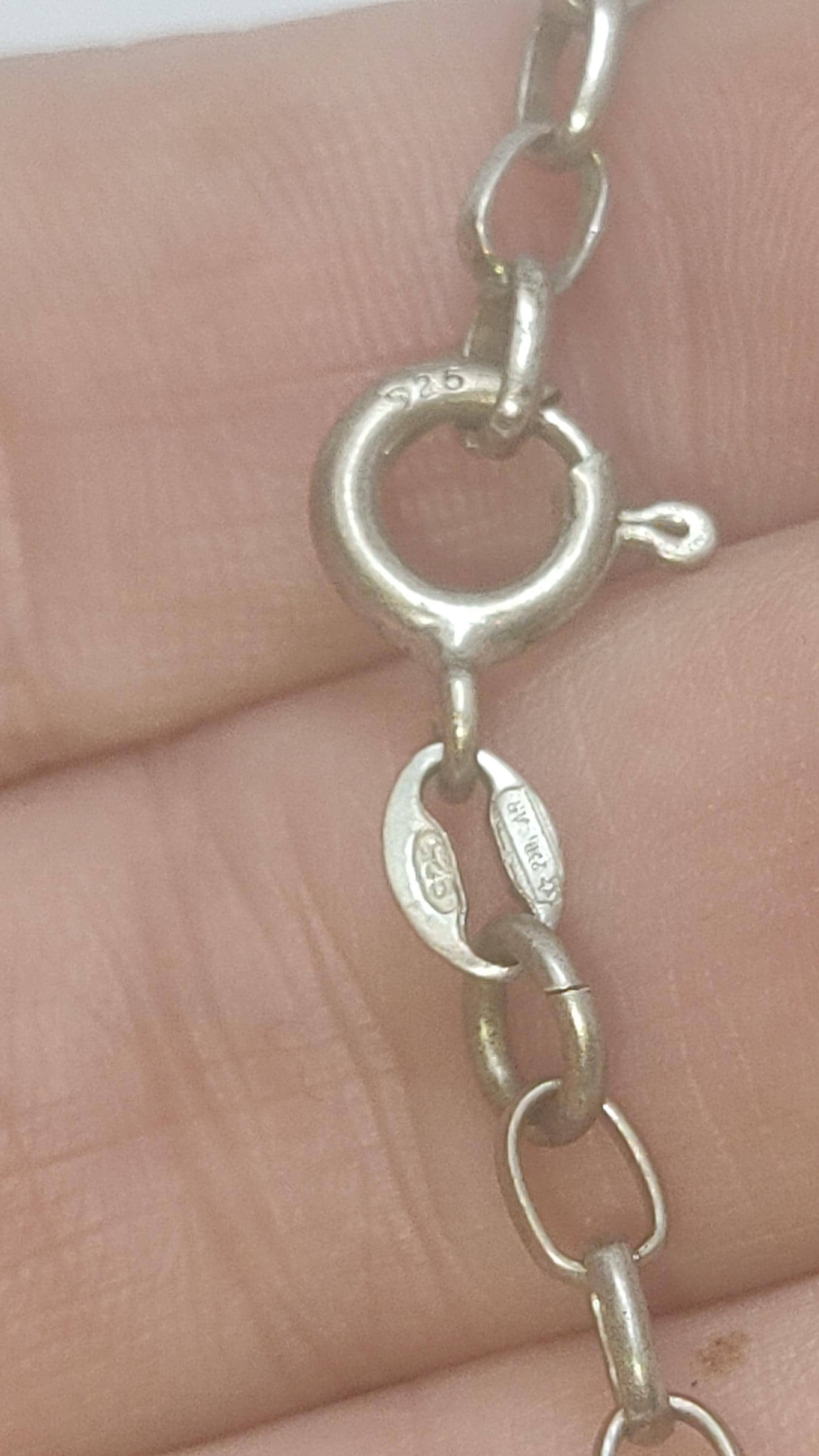 Braccialetto con ciondoli in argento sterling UNOAERRE, ciondoli a forma di ferro di cavallo e corno portafortuna italiani. - Italia