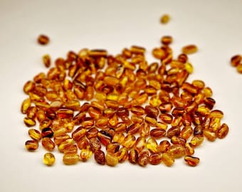 Natural baltic amber Honey/Light Cognoc olive Beads 4.5 - 6mm 50 pcs #338