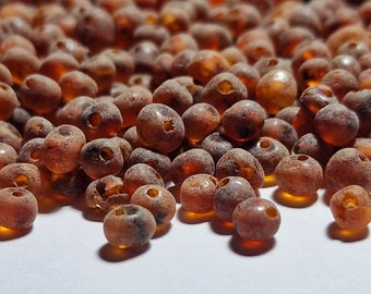 100 pcs Baltic Amber Loose Natural Baltic Amber  Beads Raw Cognoc