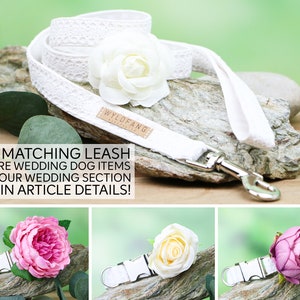 May include: White dog collar with a white lace design and a white flower. The collar has a silver buckle and a silver hook. The text "WYLDFANG" is printed on the collar. The collar is on a wooden surface.  FOR MATCHING LEASH & MORE WEDDING DOG ITEMS VISIT OUR WEDDING SECTION LINK IN ARTICLE DETAILS!