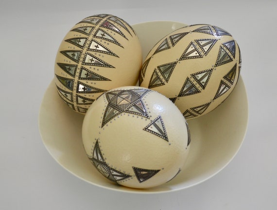Three Decorative Pewter Inlaid Ostrich Eggs