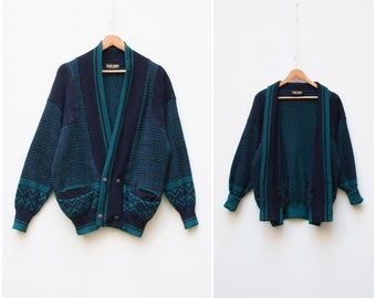 Code : 503. Size M Please check the dimensione Double row buttoning shawl collar cardigan 1980s dark blue metall fiber knitted cardigan