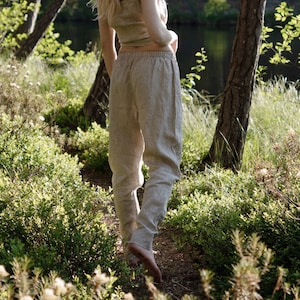 Organic, sustainable beige linen pants that can be worn as a loungewear, pajamas or sweatpants. These pants are natural, comfortable, soft and pure. These pants are a conscious and healthy choice for your body and environment. Handmade in the North.