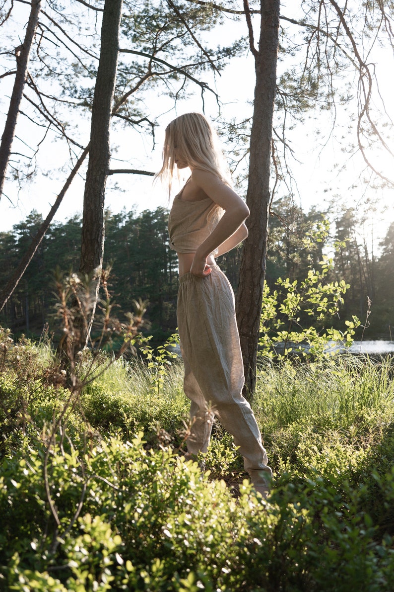 Organic, sustainable beige linen pants that can be worn as a loungewear, pajamas or sweatpants. These pants are natural, comfortable, soft and pure. These pants are a conscious and healthy choice for your body and environment. Handmade in the North.