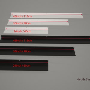 May include: A set of floating shelves in white and black. The shelves are available in three sizes: 46 inches (115cm), 36 inches (90cm), and 24 inches (60cm) long, with a depth of 5 inches (12.5cm).