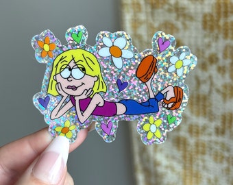 May include: A cartoon sticker of a woman with blonde hair laying down with her head resting on her hand. She is wearing a purple tank top and blue jeans. The sticker is on a silver glitter background with colorful flowers and hearts.