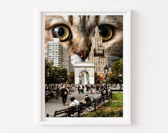 May include: A photo collage of a cat's face with large, green eyes, a brown nose, and whiskers. The cat's face is superimposed over a photo of a city park with a large archway and a fountain. People are walking through the park.