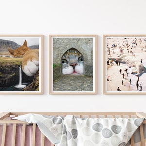 May include: Three framed prints of a cat's face superimposed on different landscapes. The first print shows a cat's face in a stone archway, the second shows a cat's face in a waterfall, and the third shows a cat's face in a beach scene.