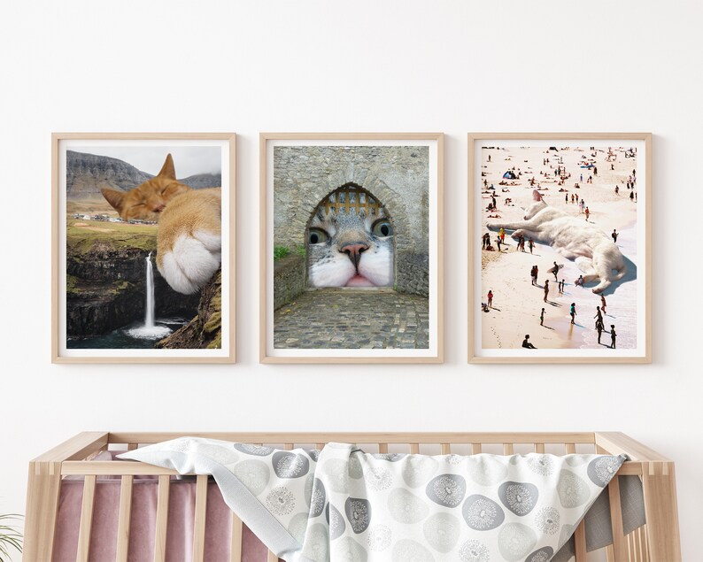 May include: Three framed prints of a cat's face superimposed on different landscapes. The first print shows a cat's face in a stone archway, the second shows a cat's face in a waterfall, and the third shows a cat's face in a beach scene.