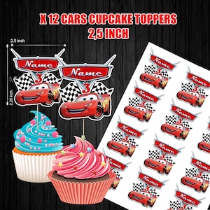 May include: Red Lightning McQueen car cupcake toppers with the text "Name" and a checkered flag design. The toppers are 2.5 inches in size and are displayed with two cupcakes, one with blue frosting and the other with pink frosting.