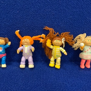 Vintage lot of 4 Cabbage Patch Doll Figurines