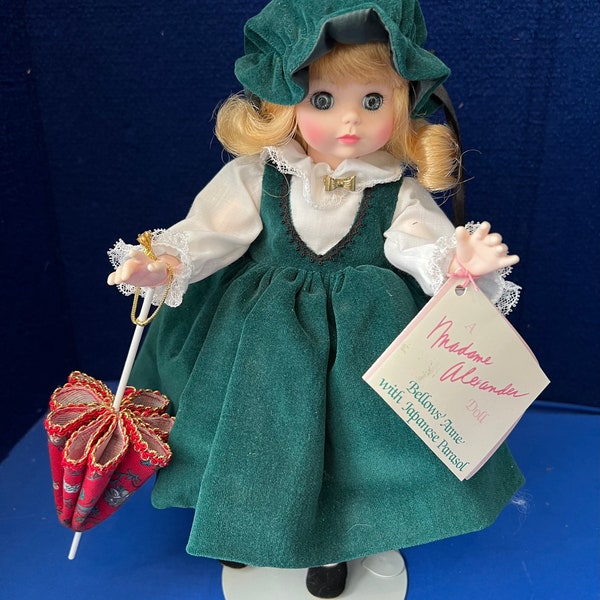 Vintage Anne Bellows New Madame Alexander #1568 14” Doll With Parasol In Original Outfit, With Wrist Tag, Box and Stand