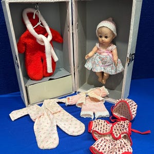 1950’s 8” Vinyl Drink & Wet Baby Doll in Casr with Wardrobe
