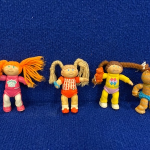 Vintage lot of 4 Cabbage Patch Doll Figurines