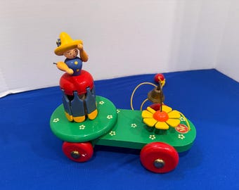 Vintage Mertens Kunst German Wooden Mechanical Pull Toy, Clown, Bell, Flower