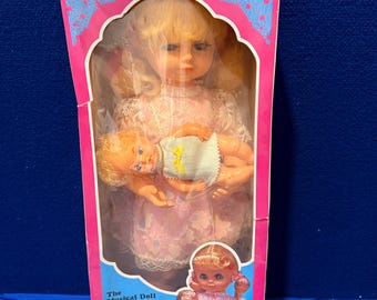 Vintage "June & Julie" Wind-Up Musical  Doll and Baby Set, Circa 1970’s