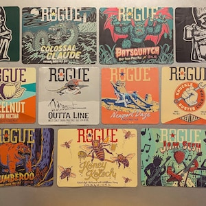 May include: A collection of 10 square stickers featuring different Rogue Brewery beers. The stickers feature various designs, including a cartoon monster, a cartoon man, a cartoon creature, a cartoon bear, a cartoon bee, and a cartoon band. The stickers are all in different colors and have the Rogue Brewery logo on them.