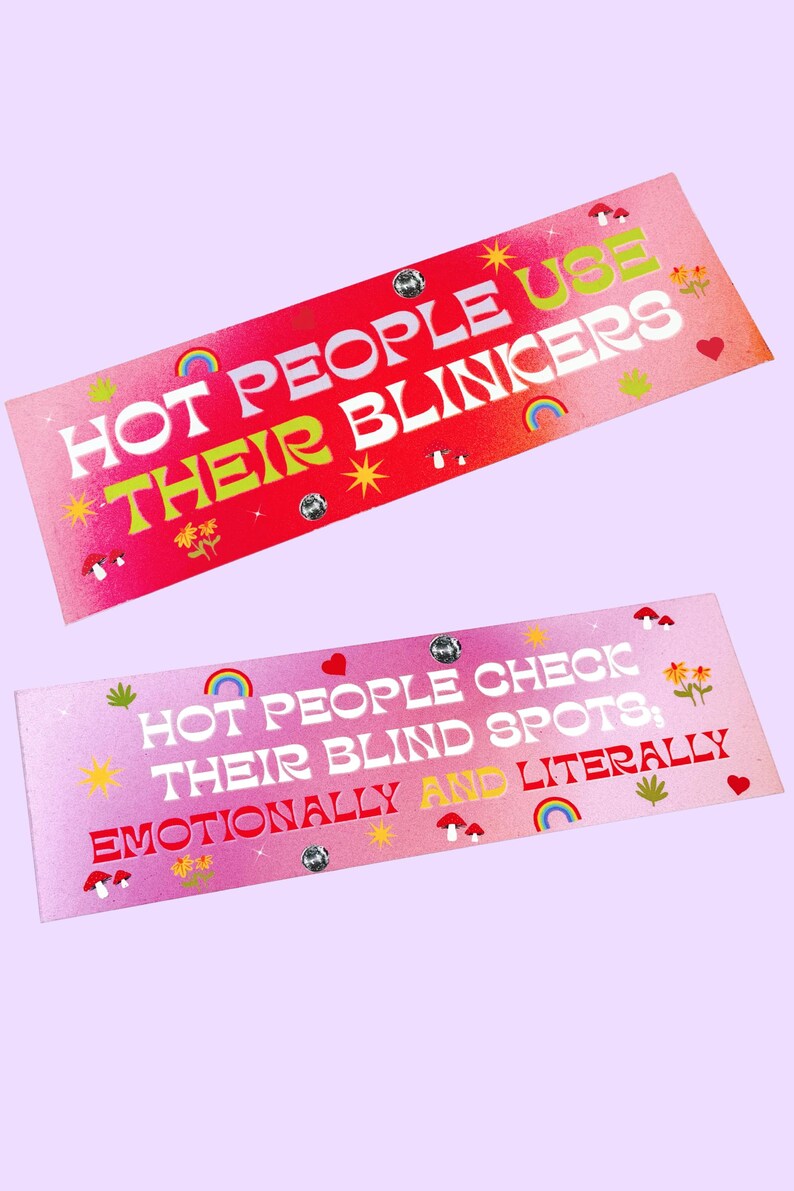 May include: Two rectangular stickers with text. The top sticker is red with the words "HOT PEOPLE USE THEIR BLINKERS" in white and green. The bottom sticker is pink with the words "HOT PEOPLE CHECK THEIR BLIND SPOTS; EMOTIONALLY AND LITERALLY".