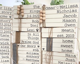 Personalized Stamped Book Stack: Custom Name Book Decor, unbound paperback book with hand stamped names and dates