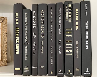 Bundle of black books, staging books, home decor, decorative books, bookshelf decor, table books, book stack, books