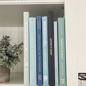Coffee table blue book, coastal bookshelf decorative book, beach interior home decor staging, used blue book bundle of 7, blue book decor