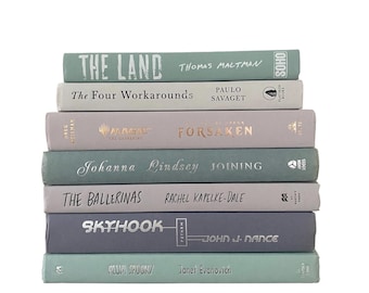 May include: A stack of eight books with different titles and authors. The books are in shades of blue and gray. The titles include "The Land", "The Four Workarounds", "Forsaken", "Joining", "The Ballerinas", "Skyhook", and "Plum Spooky".