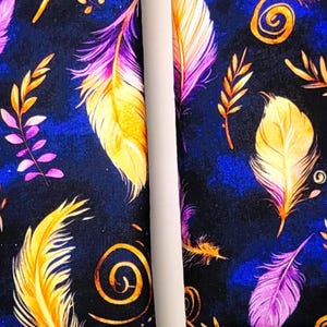 May include: A set of three ceramic nesting bowls with a speckled, cream-colored glaze. The bowls vary in size, with the largest measuring approximately 6 inches in diameter. Each bowl has a rounded shape and a simple, minimalist design.