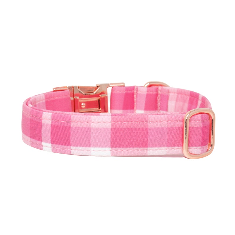 May include: Pink and white plaid dog collar with a rose gold buckle and D-ring.