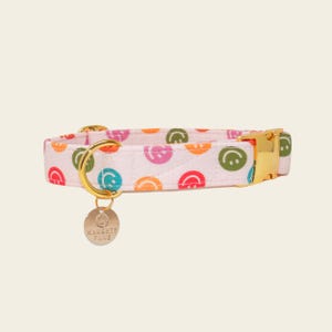 Boho smiley face dog collar with muted rainbow colors and luxury gold buckle