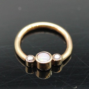 16g or 18g ring with 3mm White Opal center and 1.7mm VS1 E/F color Real Diamond side stones