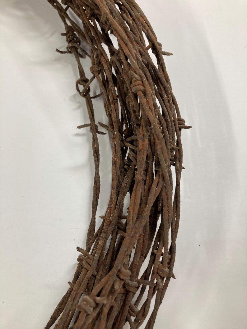 May include: A rustic wooden sign with the text "Welcome to our home" in white lettering. The sign features a distressed finish and a simple, inviting design, perfect for entryway decor.