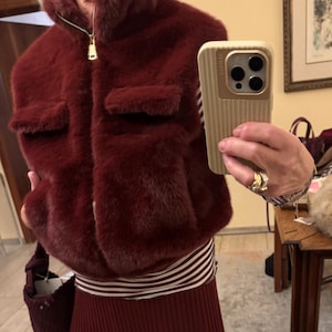 Cozy teddy faux fur vest with zipper, one size fits 34, 36, 38, available in various colors.