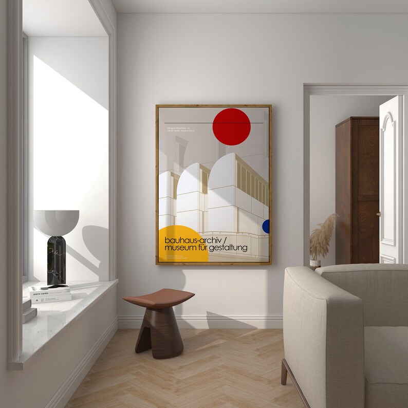 May include: A framed poster with a geometric design in white, yellow, red, and blue. The poster features the text "bauhaus-archiv/ museum f&uuml;r gestaltung".