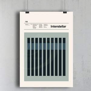 May include: A minimalist poster with the title "Interstellar" in black text. The poster features a geometric design of 14 vertical black and blue bars on a light green background.