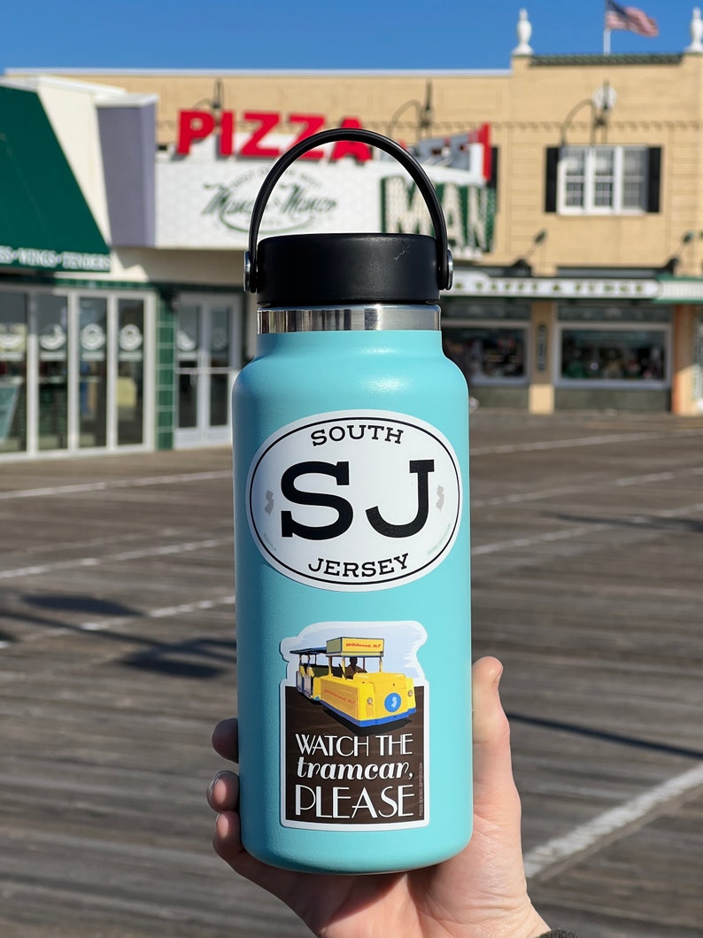 Watch the Tramcar Please Wildwood Sticker on Hydroflask on Boardwalk