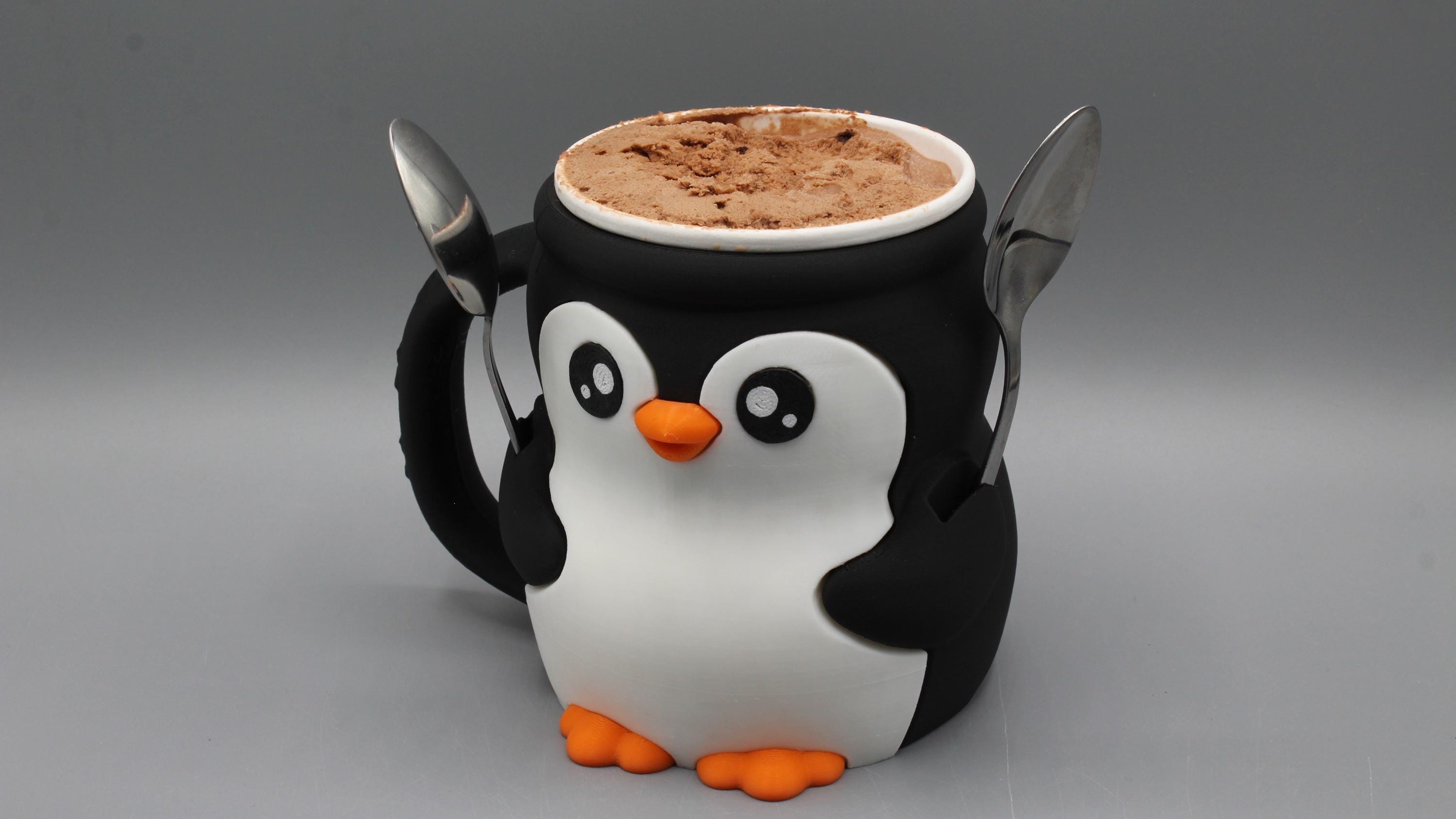 Portavasos de helado con forma de pingüino y dos portacucharas. Regalo perfecto para el verano.