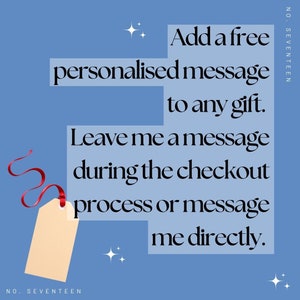 May include: A blue background with white stars and the text "Add a free personalized message to any gift. Leave me a message during the checkout process or message me directly." A red ribbon is attached to a brown tag with the text "NO. SEVENTEEN" at the bottom.