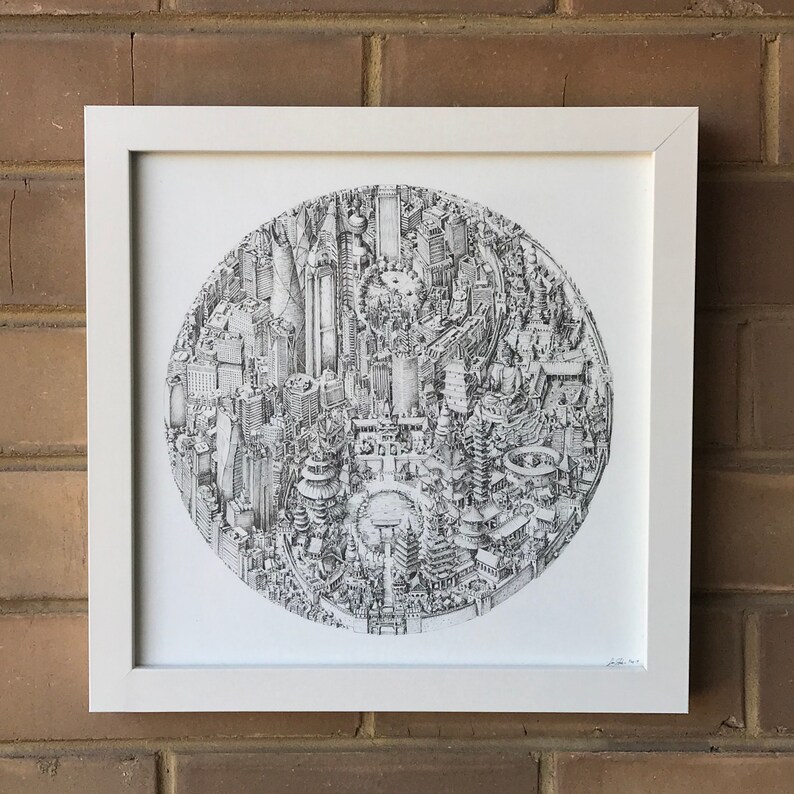 May include: A black and white pen and ink drawing of a city skyline, framed in a white frame. The drawing is in a circle and depicts a variety of buildings, including skyscrapers, churches, and other structures.