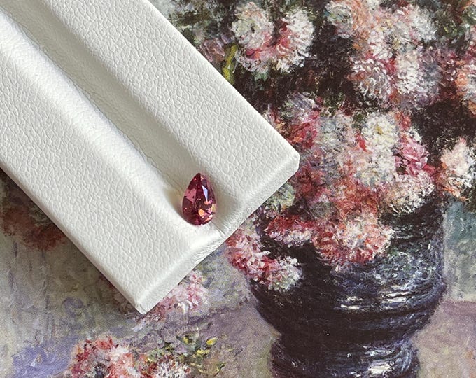 0.67ct Natural Faceted Pear Shape Purplish Pink Malaya Garnet